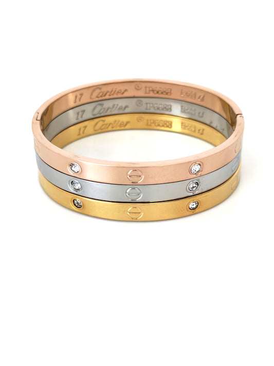 TRIPLE BRANDED CRTR STAINLESS STEEL BANGLES